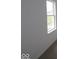 This bedroom features neutral walls, a window, carpet, and white trim at 3993 Bozeman Way, Bargersville, IN 46106