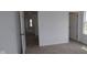 Carpeted bedroom with white walls and trim with open doorways at 3993 Bozeman Way, Bargersville, IN 46106