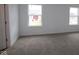 Carpeted bedroom with white walls and large windows to let in the natural light at 3993 Bozeman Way, Bargersville, IN 46106