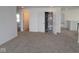 Spacious bonus room featuring plush carpeting, white walls, and open doorways offering flexible layout options at 3993 Bozeman Way, Bargersville, IN 46106