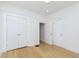 Empty bedroom with white trim, wood floors, and lots of natural light at 4226 Cornelius Ave, Indianapolis, IN 46208