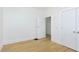 Empty bedroom with white trim, wood floors, and lots of natural light at 4226 Cornelius Ave, Indianapolis, IN 46208