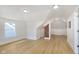 Spacious bedroom filled with natural light, featuring exposed brick and hardwood flooring at 4226 Cornelius Ave, Indianapolis, IN 46208