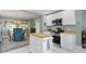 Charming kitchen with island, butcher block counters, and stainless steel appliances at 4813 E 11Th St, Indianapolis, IN 46201