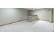 Finished basement area with a stone-clad bar, neutral walls, and plush carpet flooring at 5037 Surrey Ln, Carmel, IN 46033