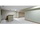 Spacious finished basement featuring a bar area, neutral walls and plush carpet flooring at 5037 Surrey Ln, Carmel, IN 46033