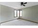 Bright bedroom with a neutral color scheme, carpet flooring, and natural light from a large window at 5037 Surrey Ln, Carmel, IN 46033