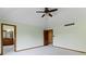 Spacious bedroom with a ceiling fan, access to the bathroom and views of the en-suite bathroom at 5037 Surrey Ln, Carmel, IN 46033