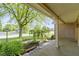 Inviting porch area with decorative landscaping and manicured lawn at 5037 Surrey Ln, Carmel, IN 46033