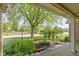 Inviting porch area with decorative landscaping and manicured lawn at 5037 Surrey Ln, Carmel, IN 46033