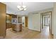 Kitchen featuring stainless steel appliances, wood cabinets, and a center island at 5037 Surrey Ln, Carmel, IN 46033