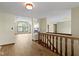 Bright living area with hardwood floors and views of the surrounding neighborhood at 5037 Surrey Ln, Carmel, IN 46033