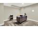 This home office features a desk, comfortable seating and space for any task at 5668 Champion Way, Greenwood, IN 46143
