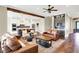 Spacious living room transitions into the kitchen, creating an inviting atmosphere at 5668 Champion Way, Greenwood, IN 46143