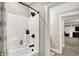 This clean shower features a large shower head, ample shelving and a clear glass door at 5668 Champion Way, Greenwood, IN 46143