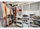 Spacious walk-in closet with shelving, hanging racks, and ample storage at 5668 Champion Way, Greenwood, IN 46143