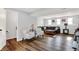 Finished basement featuring hardwood floors and comfortable seating at 586 Shady Creek Dr, Greenwood, IN 46142