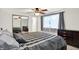 Inviting bedroom featuring a comfortable bed, mirrored closet, and neutral color scheme at 586 Shady Creek Dr, Greenwood, IN 46142