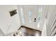 Bright foyer with a white front door with decorative glass panels and wood flooring at 586 Shady Creek Dr, Greenwood, IN 46142