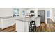 Modern kitchen with stainless steel appliances, white cabinets, and a large island at 586 Shady Creek Dr, Greenwood, IN 46142