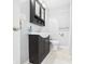 Bathroom with grey walls, vanity, toilet, and white shower curtain at 624 10Th St, Chesterfield, IN 46017