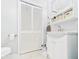 Clean bathroom with a toilet and a vanity with cupboard space at 624 10Th St, Chesterfield, IN 46017
