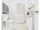 Clean bathroom with a toilet and a vanity with cupboard space at 624 10Th St, Chesterfield, IN 46017