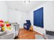 Bedroom with hardwood floors, crib, toys, and a blue toy chest at 624 10Th St, Chesterfield, IN 46017