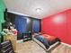 Vibrant bedroom with color block walls, and a comfortable bed at 624 10Th St, Chesterfield, IN 46017