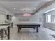 Finished basement with a bar and a ping pong table at 6525 Carolina Blvd, Indianapolis, IN 46217