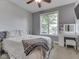 Bedroom with a bed, a window and a vanity table at 6525 Carolina Blvd, Indianapolis, IN 46217