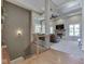 Open living room with coffered ceilings, a fireplace, and hardwood floors at 6525 Carolina Blvd, Indianapolis, IN 46217