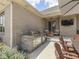 Outdoor kitchen featuring a stone-clad grill, countertops, and a dining area on the patio at 6525 Carolina Blvd, Indianapolis, IN 46217