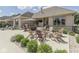 Outdoor patio with lounge chairs, a dining table, a fire pit, and landscaping at 6525 Carolina Blvd, Indianapolis, IN 46217