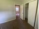 Another bedroom view showcases closet and doorway to another room at 667 E Edgewood Ave, Indianapolis, IN 46227