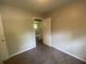 Cozy bedroom featuring neutral walls and carpet floors ready to be updated at 667 E Edgewood Ave, Indianapolis, IN 46227