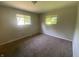Bright bedroom featuring two windows providing natural light at 667 E Edgewood Ave, Indianapolis, IN 46227