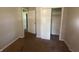 Cozy bedroom with closet and doorway to another room at 667 E Edgewood Ave, Indianapolis, IN 46227