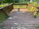 Spacious wooden deck overlooking backyard is perfect for entertaining at 667 E Edgewood Ave, Indianapolis, IN 46227