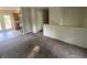 Spacious living room featuring neutral walls and carpeted floors ready to be updated at 667 E Edgewood Ave, Indianapolis, IN 46227