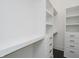 Custom closet with shelving, drawers, and hanging space to efficiently organize your wardrobe at 704 Parkway Ave, Indianapolis, IN 46203
