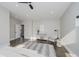 Well-lit main bedroom suite featuring hardwood floors, neutral walls, and ample space at 704 Parkway Ave, Indianapolis, IN 46203