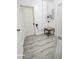 Cozy laundry room equipped with ironing board and ample storage space at 731 Sunset Blvd, Greenwood, IN 46142