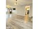 Open-concept living area with modern flooring, neutral paint, and abundant natural light at 731 Sunset Blvd, Greenwood, IN 46142