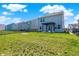 Wide shot of a spacious, fenced backyard with a pergola, offering a great space for outdoor fun and relaxation at 741 Scarsdale Ln, Danville, IN 46122