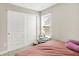 Bedroom featuring neutral walls and a bright window at 741 Scarsdale Ln, Danville, IN 46122