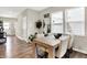 Bright dining room with a wooden table and upholstered chairs, creating a cozy space for Gathering meals and gatherings at 741 Scarsdale Ln, Danville, IN 46122