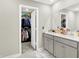 The bathroom features a double vanity and a spacious walk-in closet at 741 Scarsdale Ln, Danville, IN 46122