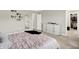 Spacious main bedroom with walk-in closet, a neutral color scheme, and decorative shelving at 741 Scarsdale Ln, Danville, IN 46122