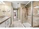 This is a full bathroom with a shower and toilet that is separate from the vanity and sink at 7833 Meadow Bend Dr, Indianapolis, IN 46259